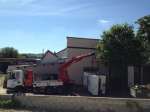 Déchargement , manutention et scellement d'un centre d'usinage de 14 tonnes à Valence